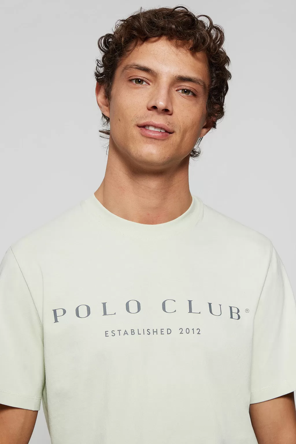 Camiseta básica verde pálido con print icónico Polo Club