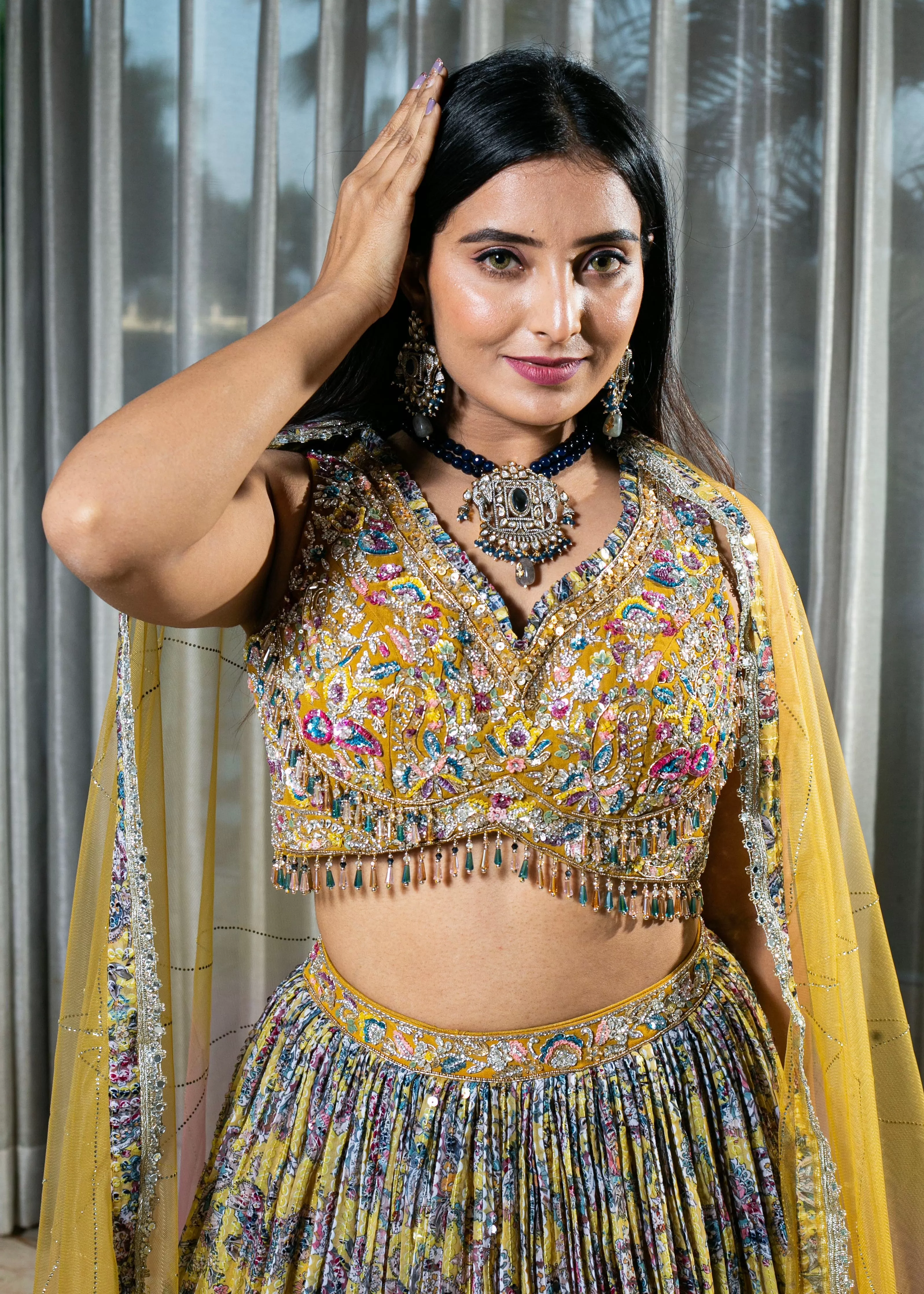 Flared Yellow Lehenga with Intricate Embroidery and Net Dupatta