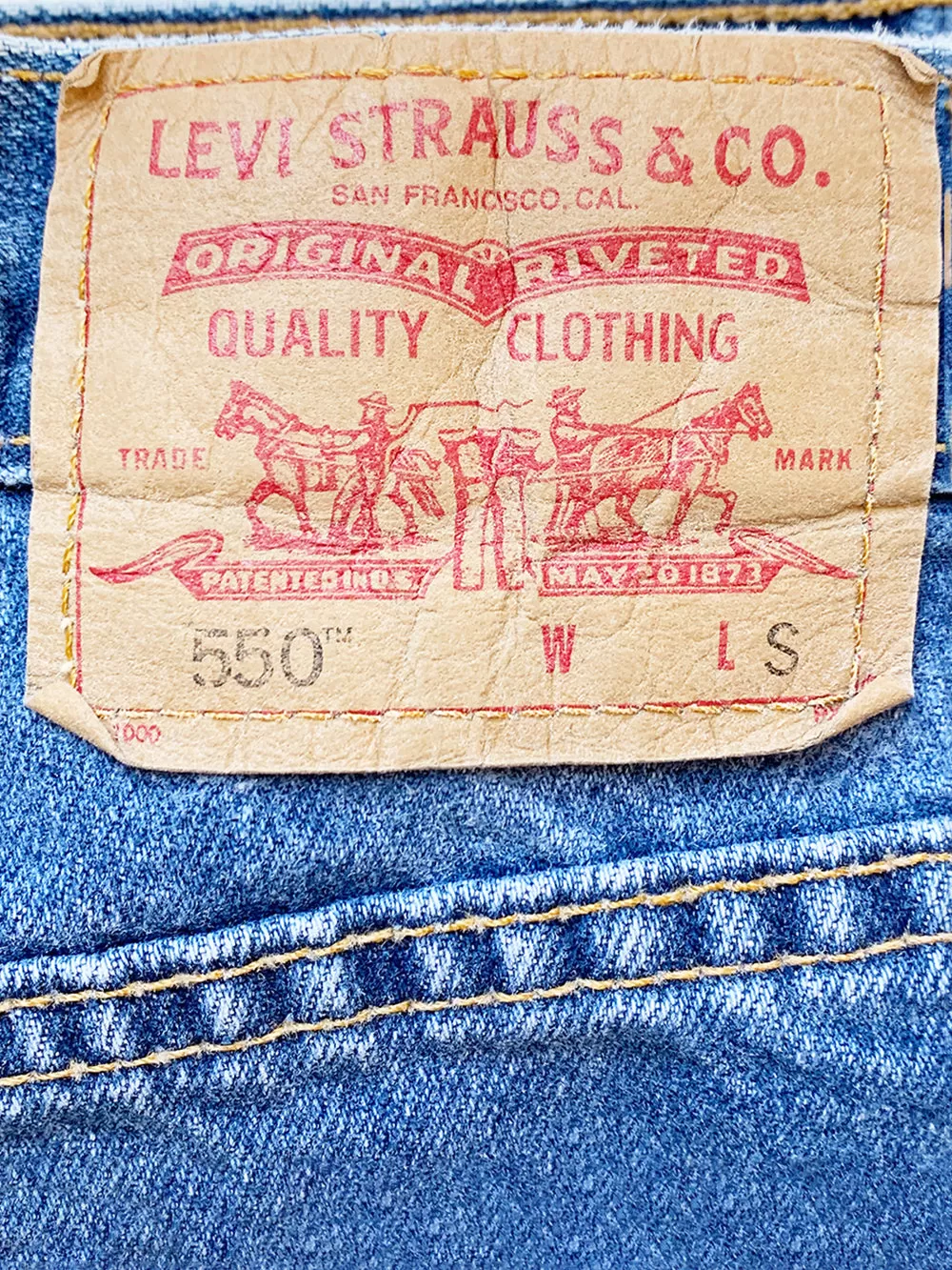 Levis 550 Medium Wash Jeans 31x27