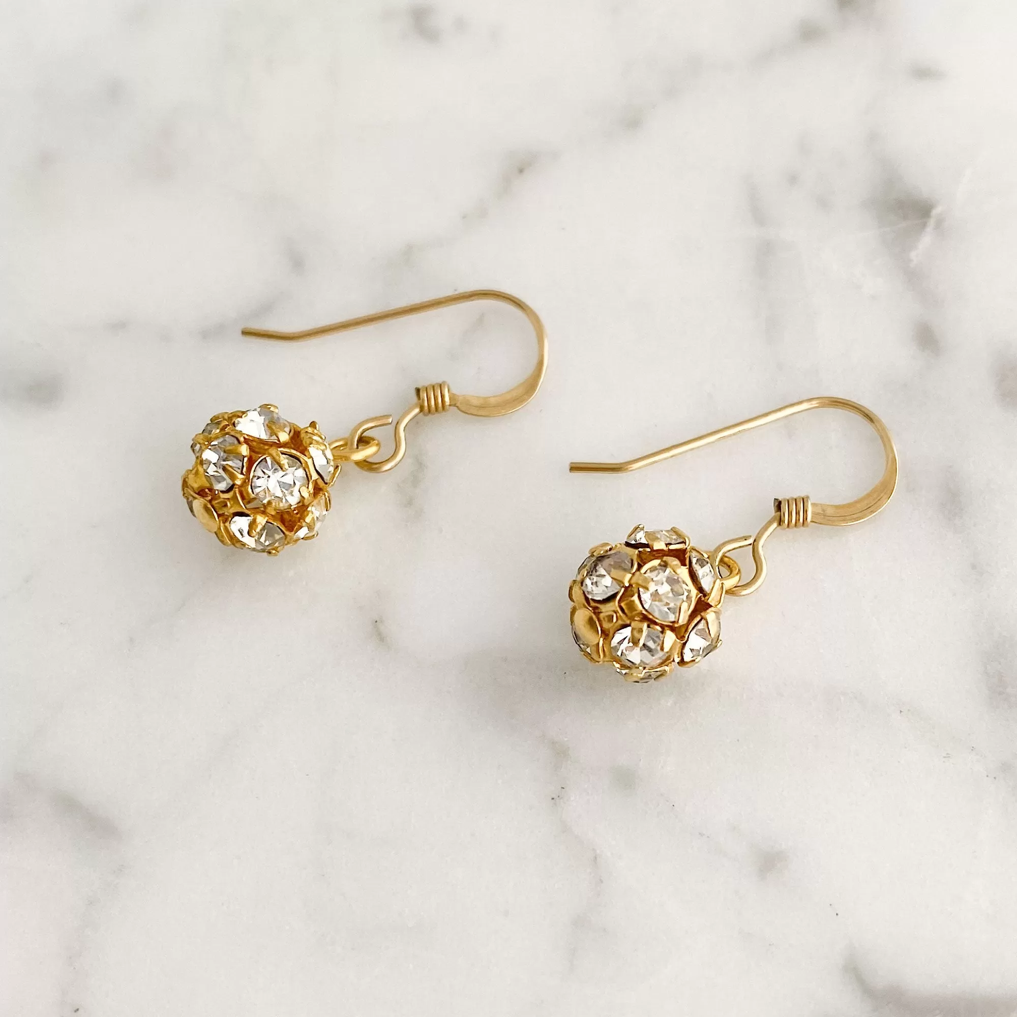 LOLA gold rhinestone ball earrings