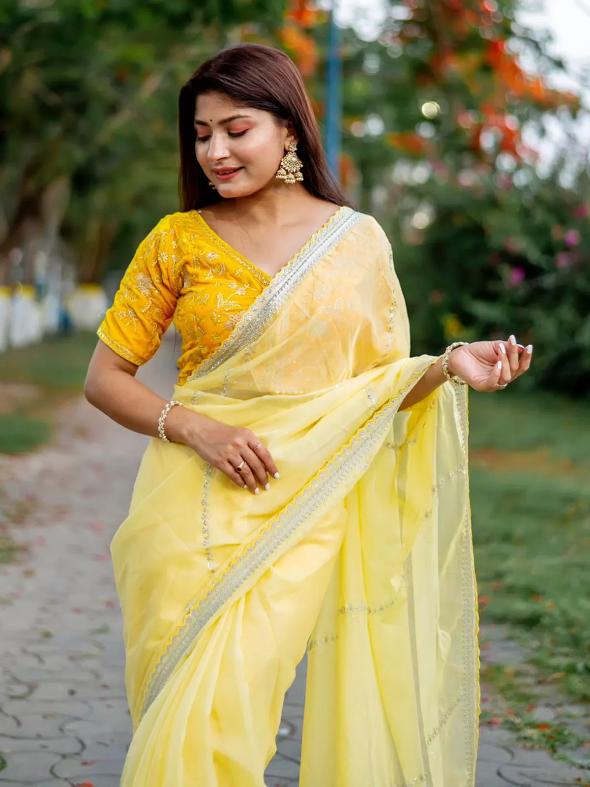 Odette Women Yellow Organza Embroidered Saree With Unstitched Blouse