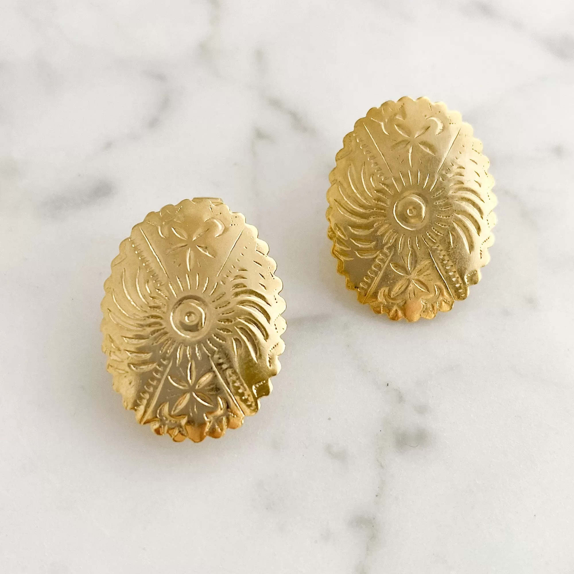 PANTHEA gold tone oval clip earrings